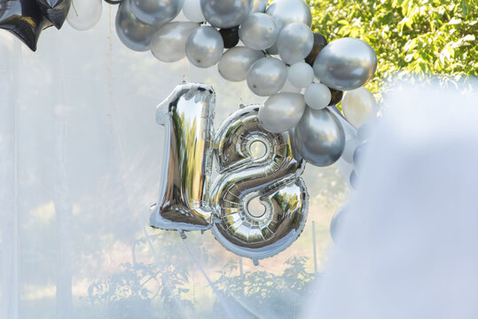 18 birthday decorative numbers and balloons