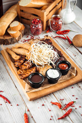 Big assorted chicken platter set with sauces 
