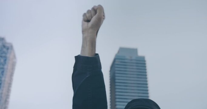 Man holding up hand at demostration protest. Social justice and peaceful protesting racial injustice