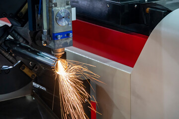 The fiber laser cutting machine cutting the stainless steel tube control by CNC program. The sheet metal working processing by laser cutting machine make the engrave at the stainless steel pipe parts.