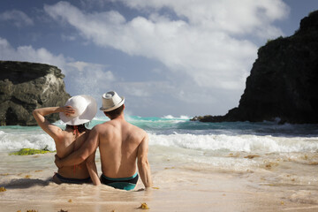 man and woman on the beach