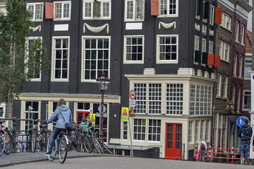 Fototapeta na wymiar Street Photography scene and architecture from Amsterdam, Holland, 2019