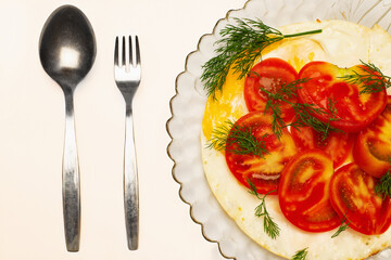 Element of delicious instant breakfast in a plate with spoon and fork.