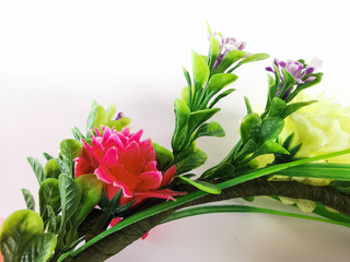 A crown of flowers on a white background