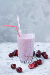 healthy summer sweet pink smoothie with cherries
