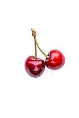Two ripe Cherry isolated on white background