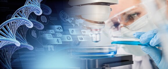 Scientist in mask and glasses working with microscope