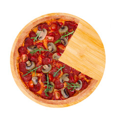 Delicious pizza hot with spicy salami, arugula, cherry tomatoes, mushrooms and texas spice mix, without a quarter on a round wooden platter, isolated on white background, top view