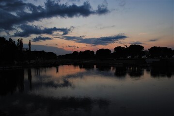 Fototapeta na wymiar Perfect sunset reflection over a lake
