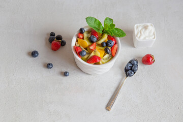 fruit salad with yogurt dressing on the side