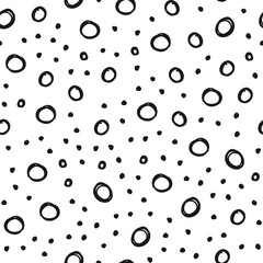 Doodle circles seamless pattern. Black dots texture background.