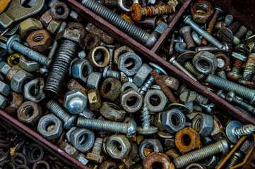 nut screws and nails iron rusty old close-up