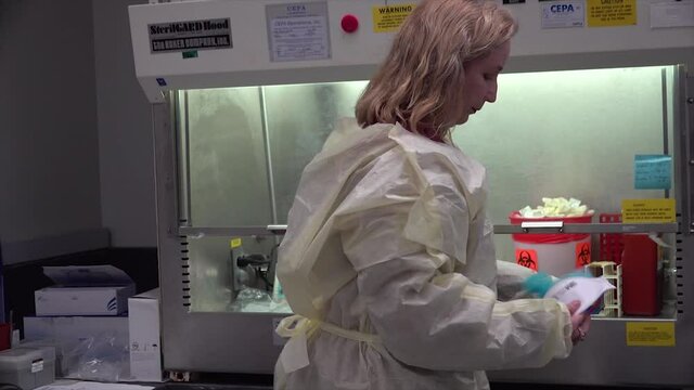 2020 - A Santa Barbara County Public Health Department laboratory technician tests patient specimens for the corona virus COVID-19 edpidemic pandemic outbreak.
