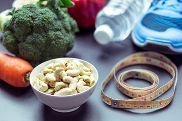 Healthy food concept,broccoli, peppers, carrots, whole grains, water.