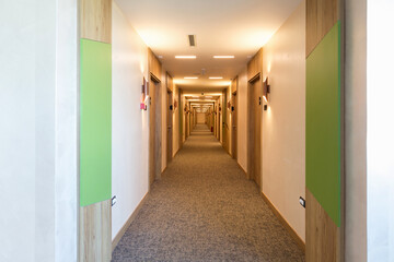 Interior of a long hotel corridor doorway