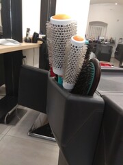 Modern hair salon interior: hairbrushes close up