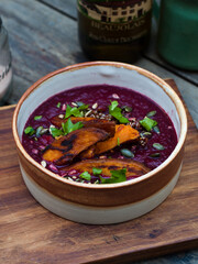 Beetroot soup recipe in bowl on table