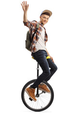 Young male student balancing a unicycle and waving © Ljupco Smokovski