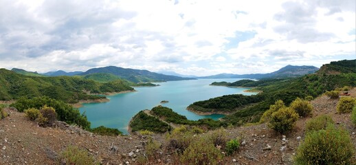 Fototapeta na wymiar Artificial lake Kremaston Greece with blue water