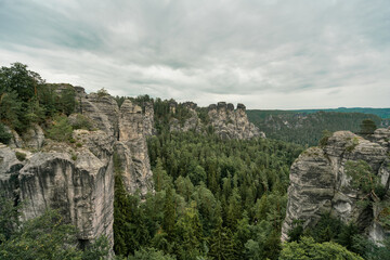 Fototapeta na wymiar Sandstone Bastei rocks at Saxon Switzerland National Park in Germany.