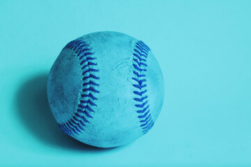 Pop art style baseball close up in blue color with copy space for sport.