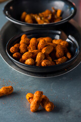 Boiled peanuts. Pistachios. Almonds. Walnuts. Cashews. Pecans. Roasted and lightly salted variety of different shelled nuts, used for ingredients in menu items at restaurants. 