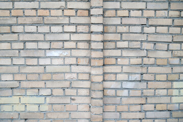 background of bricks with one abnormal row, brick wall texture