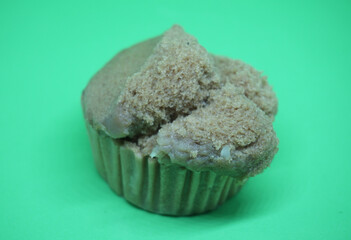 muffin sponge cake on green background.