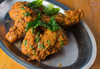 Fried Chicken. Free range chicken, soaked in buttermilk and dredged in flour deep fried in a cast iron skillet. Classic American Southern cuisine favorite.