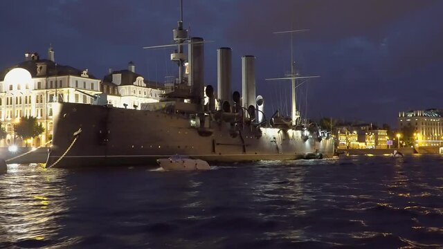 Night view from a boat on the Communist relic, the cruiser Aurora