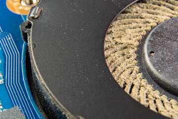 dusty fan inside the laptop during servicing