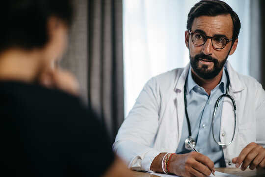 portrait of a doctor during a patient consultation