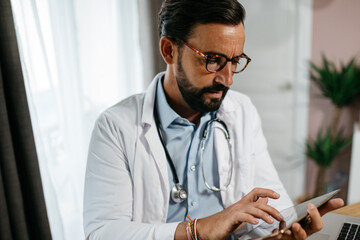 consultation of a doctor on tablet and computer