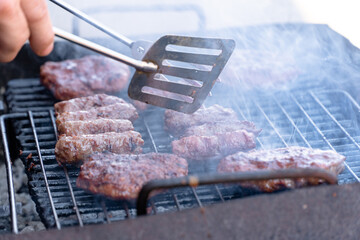 Preparing a barbecue close up photo