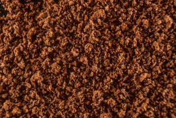 Fullscreen macro closeup with shallow depth of field of instant coffee powder. Texture. Graphic design.