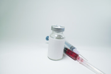 syringe and medicine bottle isolated 