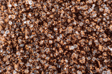 Fullscreen macro close-up with shallow depth of field of sugar mixed with instant coffee. Texture. Graphic design.
