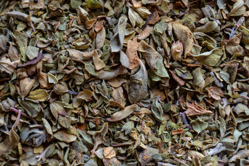 Fullscreen macro closeup of dried oregano. Food seasoning. Texture. Graphic design.