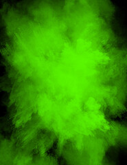 Powder explosion in a vibrant color with a black background with copy space in the powder