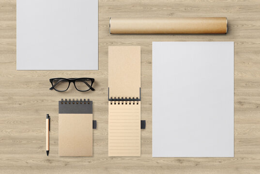 A4 Paper Notepad and Paper Cardboard Tube 
Mockup