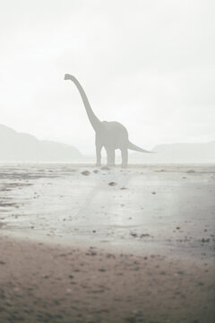 lonely dinosaur in a valley