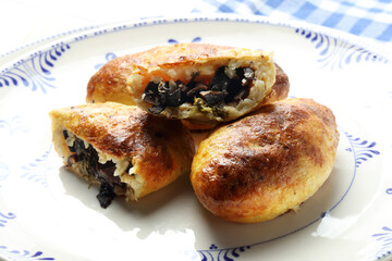 Russian traditional zrazy - potato patties stuffed with wild mushrooms