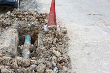 The road is closed. Repair. Overhaul of city road and tram line. Road plumbing work. Traffic cones...