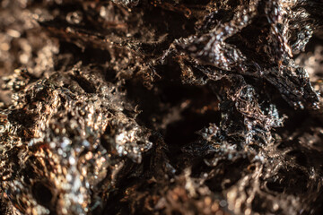Macro of slag or volcanic magma stone texture, similar to a landscape of a strange space planet