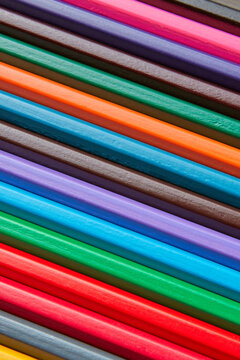 Diagonal colorful striped pencils background.