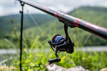 Fishing rod in the nature close up photo