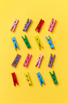 Wave pattern from colorful wooden clamps.