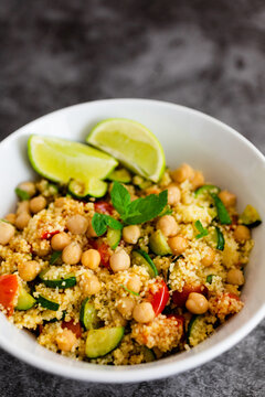 Cous cous with zucchini, lime and chickpeas