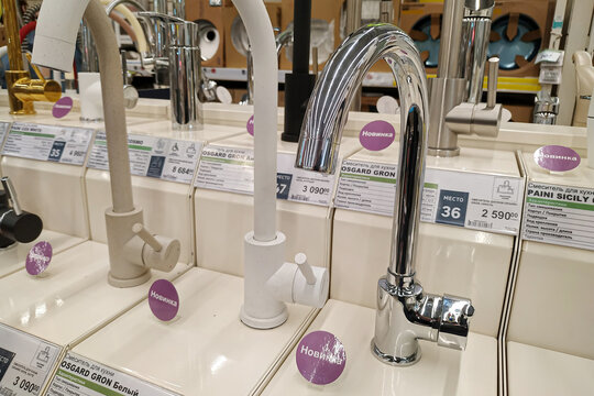 Moscow, Russia - August 17, 2019: Various water taps on the rack in a building materials store