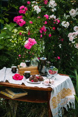 Fototapeta na wymiar Tea party in nature with homemade sweets. Chocolate truffle. Homemade fresh chocolate round cakes.